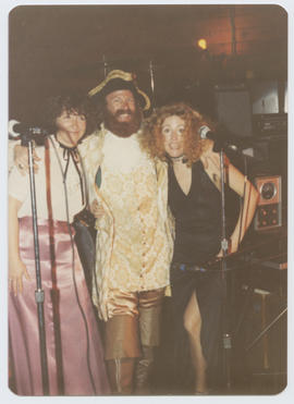 Ralf Jensen and two women at the Freaker's Ball