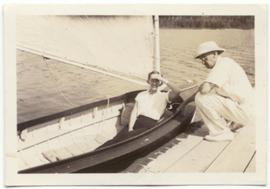 Alex Philip on the dock with woman in sailboat