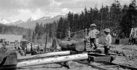 Thomas Neiland Jr. & Bob Jardine with logging machinery