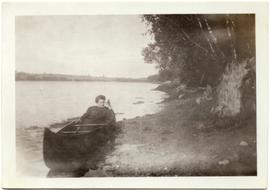 Myrtle Philip with a canoe